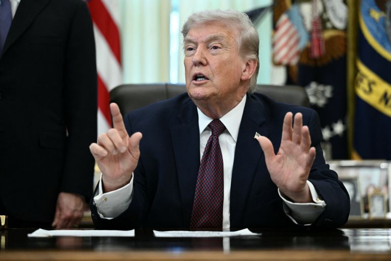 US President Donald Trump speaks after signing an executive order in the Oval Office of the White House in Washington, DC, on March 31, 2026. (Photo by Brendan SMIALOWSKI / AFP)