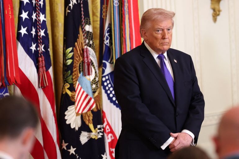 WASHINGTON, DC - MARCH 02: U.S. President Donald Trump arrives for a Medal of Honor Ceremony in the East Room of the White House on March 02, 2026 in Washington, DC. Trump awarded three soldiers the highest military decoration; Master Sgt. Roddie Edmonds, who died in 1985, for shielding Jewish prisoners from Nazi guards during World War II; then-Staff Sgt. Terry Richardson for saving 85 lives of fellow soldiers during the Vietnam War; and Staff Sgt. Michael Ollis who died in the Afghanistan War when he shielded another soldier from a suicide bomber. Win McNamee/Getty Images/AFP (Photo by WIN MCNAMEE / GETTY IMAGES NORTH AMERICA / Getty Images via AFP)