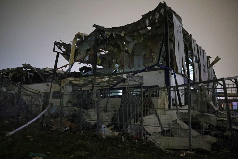 A damaged building is pictured at the site of an Iranian strike that hit a residential neighbourhood in Petah Tikva on April 2, 2026.