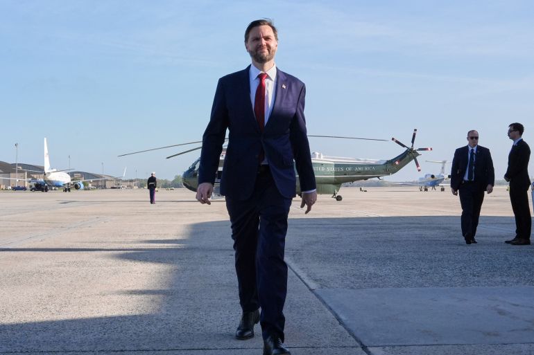 afp_69d927768b3b-1775839094 US Vice President JD Vance walks to speak to reporters before boarding Air Force Two at Joint Base Andrews, Maryland, on April 10, 2026, as he departs for Pakistan for talks on Iran.