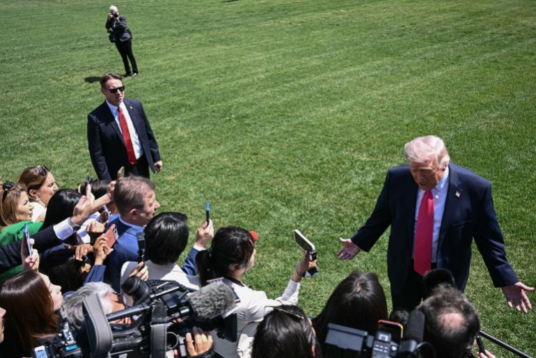 US President Donald Trump speaks to reporters before walking to board Marine One as he departs from the South Lawn of the White House in Washington, DC, on April 16, 2026.