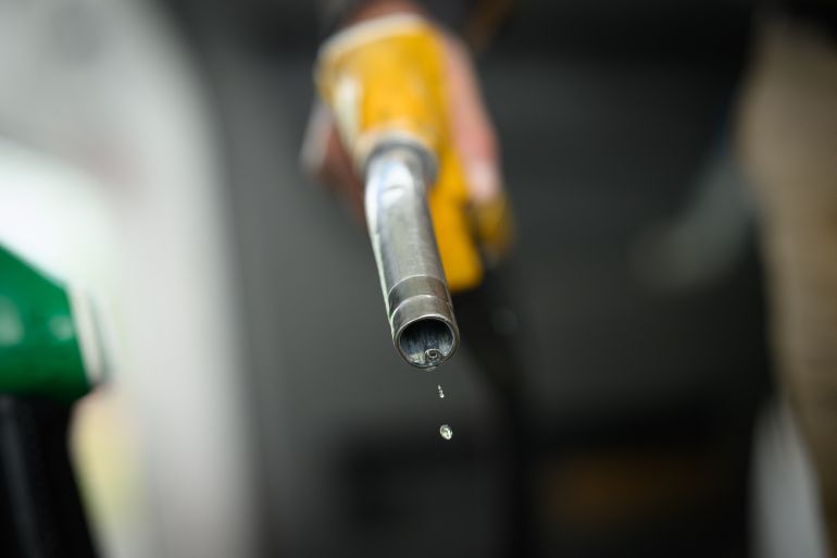 afp_69e1a477da0c-1776395383 Diesel drips out of a fuel hose at a petrol station in Saint-Etienne-de-Montluc, western France, on April 15, 2026, as US-Israel war on Iran, launched on February 28, has roiled global energy and equities markets, sending oil prices skyrocketing after Tehran virtually closed the key Strait of Hormuz. (Photo by Loic VENANCE / AFP)