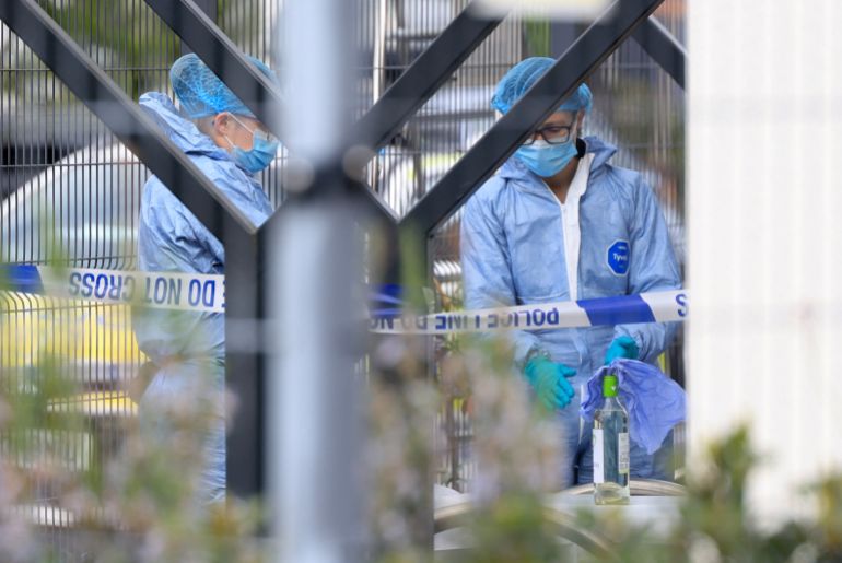 Police forensics officers work during an investigation into an attack in the early hours of the morning, at the Finchley Reform Synagogue, in the North Finchley area of north London, on April 15, 2026.