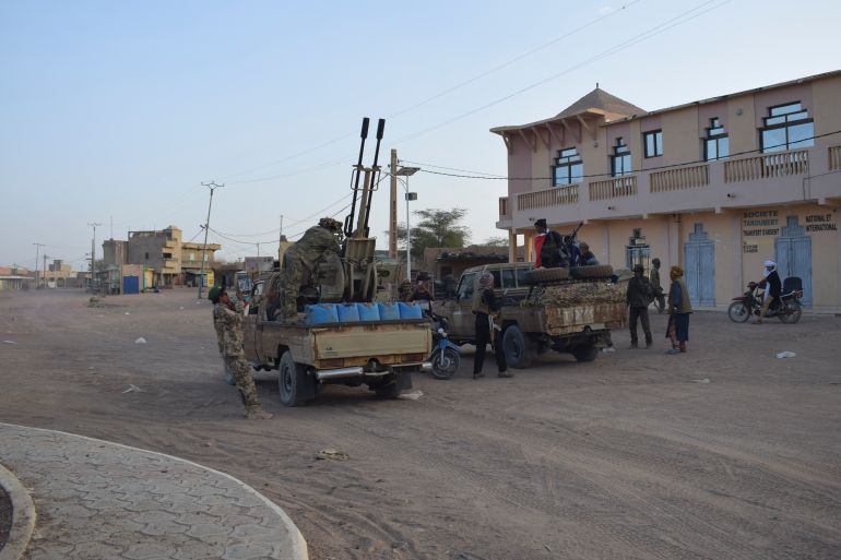 afp_69ef16dd5a7c-1777276637 Tuareg rebels of the Azawad Liberation Front (FLA) ride on the back of pickup trucks in Kidal, on April 26, 2026.