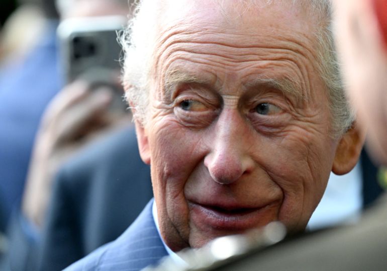 afp_69f0103076db-1777340464 Britain's King Charles III greets attendees of a garden party at the British Ambassador's Residence in Washington, DC, on April 27, 2026. (Photo by Roberto Schmidt / POOL / AFP)
