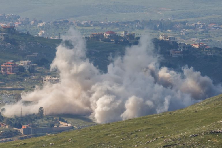 This picture taken from a position in Upper Galilee in northern Israel, near the border with Lebanon, shows smoke rising as the Israeli army demolish buildings and homes in southern Lebanon on April 29, 2026.