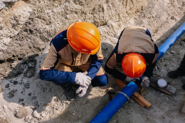 ahmed3-1777459600 Workers are installing water supply pipeline system.