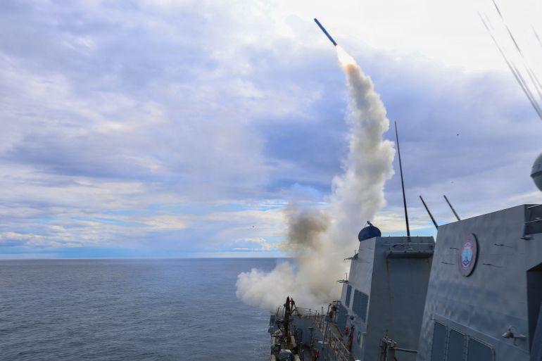 This image provided by U.S. Central Command shows the Arleigh Burke-class guided-missile destroyer USS Thomas Hudner (DDG 116) firing a Tomahawk Land Attack Missile (TLAM) in support of Operation Epic Fury, on Sunday, March 1, 2026. (U.S. Navy via AP)