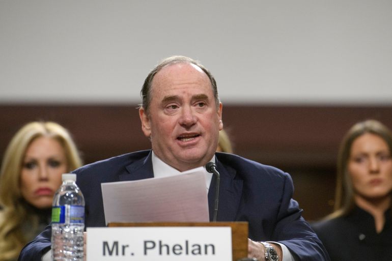 FILE - John Phelan appears before a Senate Committee on Armed Services hearing on Capitol Hill, Feb. 27, 2025, in Washington. (AP Photo/Rod Lamkey, Jr., file)
