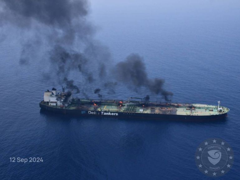 Flames and smoke rise from the Greek-flagged oil tanker Sounion, which has been on fire since August 23, after an attack by Houthi militants, on the Red Sea, September 12, 2024 in this handout image. EUNAVFOR ASPIDES/Handout via REUTERS THIS IMAGE HAS BEEN SUPPLIED BY A THIRD PARTY. MANDATORY CREDIT. TEXT AND LOGO PROVIDED AT SOURCE