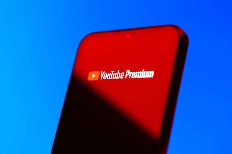 dfrg5-1775309504 Prague, Czechia - 10 21 2024: Smartphone on surface showing Youtube Premium logo.