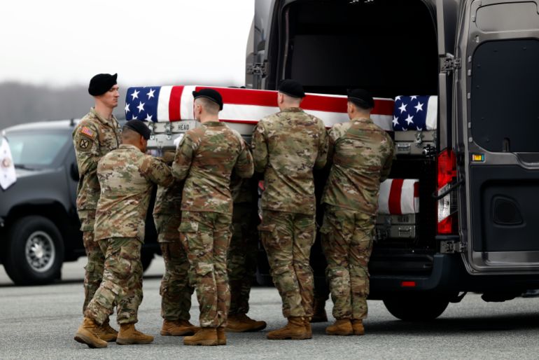 epa12802382 A US Army carry team moves a flag-draped transfer case containing the remains of Sergeant Declan J. Coady during a dignified transfer of fallen US service members, at Dover Air Force Base in Dover, Delaware, USA, 07 March 2026. The remains of the soldiers from the 103rd Sustainment Command are being returned to the United States after they were killed in a drone attack in Kuwait. EPA/WILL OLIVER