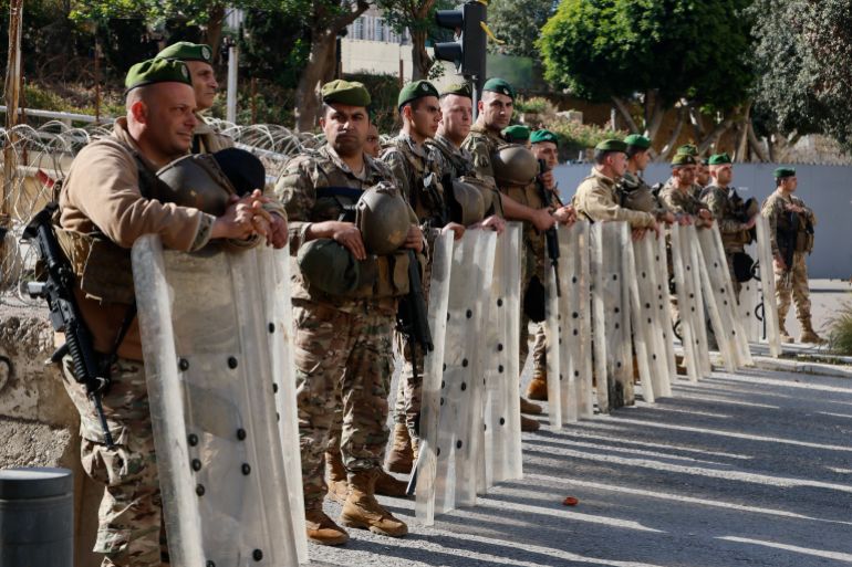 epa12883055 Lebanese soldiers stand guard during a protest by Hezbollah supporters against Lebanese President and Prime Minister outside the Government Palace in downtown Beirut, Lebanon, 11 April 2026. The protesters gathered in support of Hezbollah and to express opposition to Lebanese President Joseph Aoun and Prime Minister Nawaf Salam and against negotiations between Lebanon and Israel. Israel and Lebanon agreed to start diplomatic negotiations in the US on 14 April 2026. The talks mark the first direct talks since the failed 17 May 1983 agreement, which collapsed under domestic and regional opposition. EPA/WAEL HAMZEH