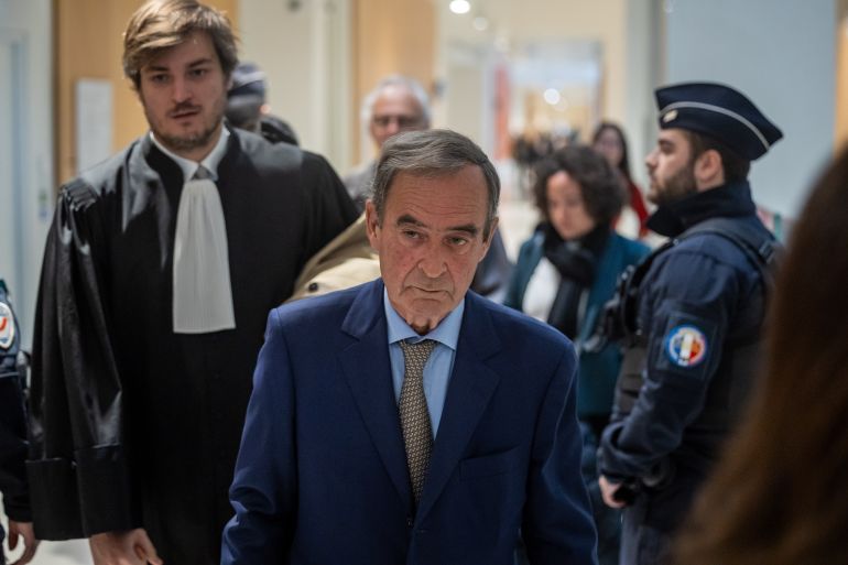 epaselect epa12887318 Former Director General of French cement group Lafarge, Bruno Lafont (C), arrives at the Paris Courthouse for the verdict in the trial of former company executives in Paris, France, 13 April 2026. A Paris court found Lafarge SA and eight former executives guilty of financing terrorist organizations in Syria, including the so-called Islamic State (IS or ISIS), to maintain operations at a plant after the 2011 outbreak of civil war. EPA/CHRISTOPHE PETIT TESSON