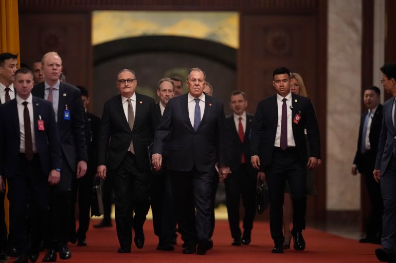epa12890793 Russia’s Foreign Minister Sergei Lavrov walks to a meeting with China’s President Xi Jinping at the Great Hall of the People in Beijing, China, 15 April 2026. EPA/Iori Sagisawa / POOL