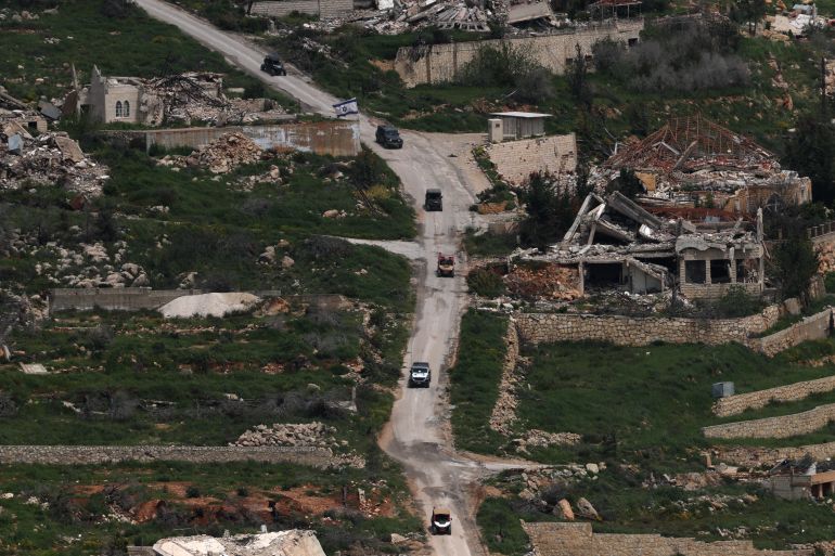 epa12896080 Israeli military vehicles maneuver on the Lebanese side of the border as seen from the Upper Galilee, on the Israel-Lebanon border, 17 April 2026. Israel and Lebanon have agreed to a 10-day ceasefire, which went into effect at midnight on 16 April. EPA/ATEF SAFADI