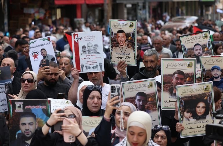 epa12900413 People attend a protest to demand the release of Palestinians jailed in Israeli prisons, on Prisoners' Day in the West Bank city of Nablus, 19 April 2026. Palestinians across several governorates in the West Bank are marking Palestinian Prisoners' Day, observed annually on 17 April, with public events and solidarity activities to support detainees held in Israeli prisons. EPA/ALAA BADARNEH