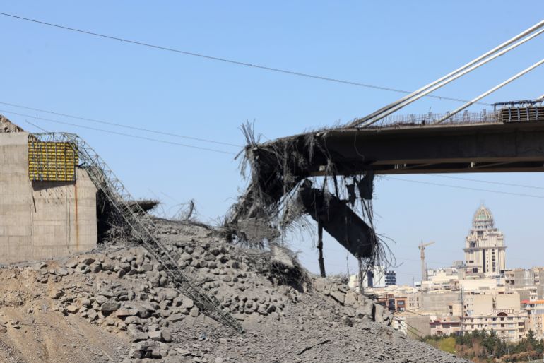 epa12867085 A view of the destruction at the B1 suspension bridge by a US airstrike in the city of Karaj, Alborz province, Iran, 03 April 2026. A joint Israeli and US military operation continues to target multiple locations across Iran since the early hours of 28 February 2026. EPA/ABEDIN TAHERKENAREH