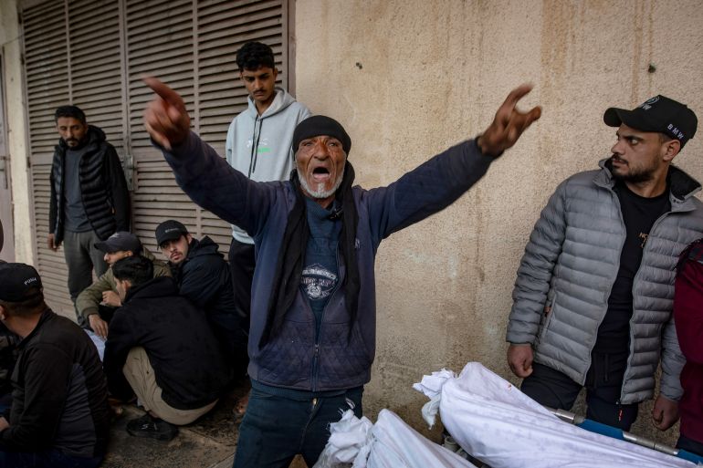 epaselect epa12872855 Palestinians mourn next to the bodies of victims killed in an Israeli airstrike at Al-Aqsa Martyrs Hospital in Deir al-Balah, central Gaza Strip, 07 April 2026. According to the Palestinian news agency WAFA, at least 10 people were killed in an Israeli strike targeting the Al-Maghazi refugee camp in the central Gaza Strip. EPA/HAITHAM IMAD