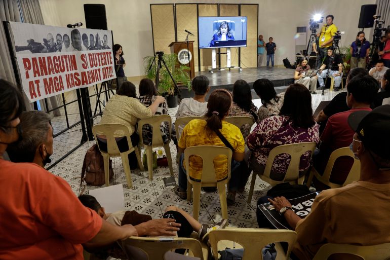 epa12906782 Relatives of victims of extrajudicial killings during the drug war campaign of former Philippine president Rodrigo Duterte watch a broadcast of the International Criminal Court (ICC) during a gathering at a university in Quezon City, Metro Manila, Philippines, 22 April 2026. The ICC at The Hague on 22 April denied the appeal of Duterte challenging the judicial body's jurisdiction over the charges filed against the former leader. Duterte faces charges of crimes against humanity resulting from his anti-illegal drugs campaign. EPA/ROLEX DELA PENA