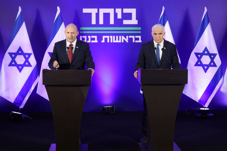 epa12915792 Former Israeli prime ministers Naftali Bennett (L) and Yair Lapid (R) hold a joint press conference in Herzliya, Israel, 26 April 2026. The two leaders announced they will run together in the upcoming general elections under a new unified party called 'Together'. Israel's general elections are scheduled for 27 October 2026. EPA/ABIR SULTAN