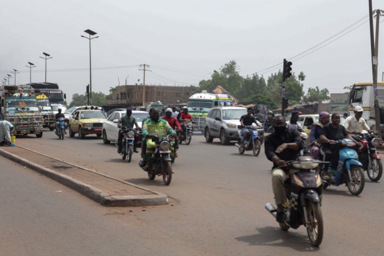 epa_69f335c1edac-1777546689 epa12917263 Commuters drive through the streets of Bamako, Mali, 27 April 2026. Malian authorities stated that a series of coordinated attacks were launched on 25 April by Islamic militants and separatists across the West African country. Following the assassination of Defense Minister Sadio Camara in a suicide car bombing at his Kati residence, the capital remains under a three-day overnight curfew. EPA/HADAMA DIAKITE