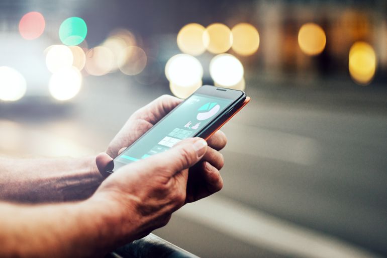 Smartphone showing health data, close-up.