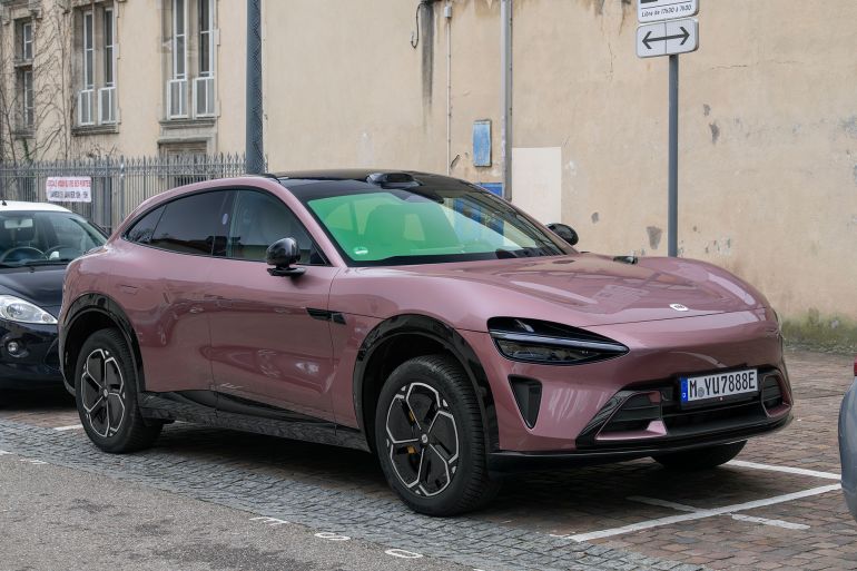 Nancy, France - January 18th 2026 : View on a purple Xiaomi YU7 Max finished in Danxia Purple parked on a street between cars.