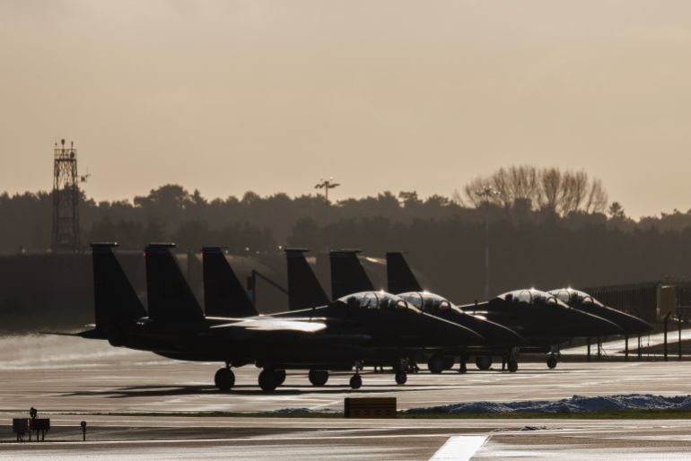 LAKENHEATH, ENGLAND - JANUARY 07: F15 fighter planes wait to take off from RAF Lakenheath on January 07, 2026 in Mildenhall, England. There have been recent reports of increased United States Air Force aircraft arriving at American bases in England this week, including RAF Fairford in Gloucestershire and at RAF Mildenhall in Suffolk. The reports coincide with today’s US seizure of the Marinera (previously called the Bella-1), a Russian-flagged tanker in the North Atlantic, and against the backdrop of statements from US officials, including the president, vowing to acquire Greenland, a self-governed territory of Denmark, a NATO member. (Photo by Dan Kitwood/Getty Images)