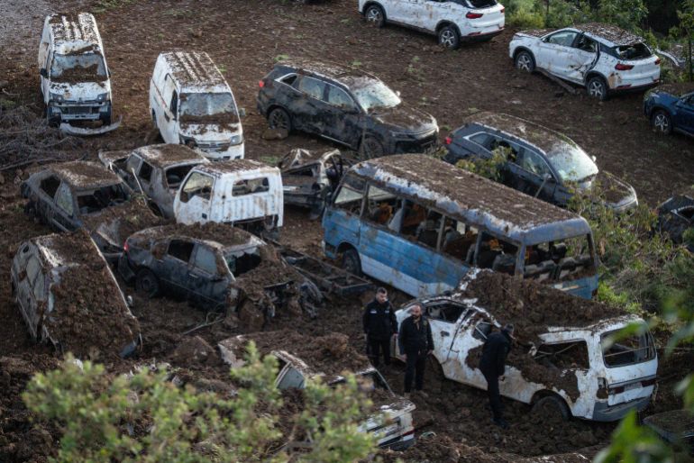 BEIRUT, LEBANON - MARCH 31: Members of the Lebanese Army Intelligence service inspect damaged cars after and Israeli airstrike hit a new car holding yard in the Christian neighbourhood of Mansourieh on March 31, 2026 in Beirut, Lebanon. Israel has continued its aerial and ground assault in Lebanon after Hezbollah, the Iran-backed militant group in Lebanon, launched missiles at Israel in what it said was retaliation for the joint U.S.-Israeli war on Iran. (Photo by Chris McGrath/Getty Images)