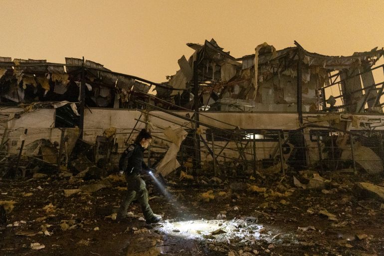 PETACH TIKVA, ISRAEL - APRIL 02: Israeli emergency responders inspect a scene of a direct ballistic hit, after it was launched from Iran on April 02, 2026 in Petach Tikva, Israel. Iran has continued firing waves of drones and missiles at Israel after the United States and Israel launched a joint attack on Iran early on February 28th. (Photo by Amir Levy/Getty Images)