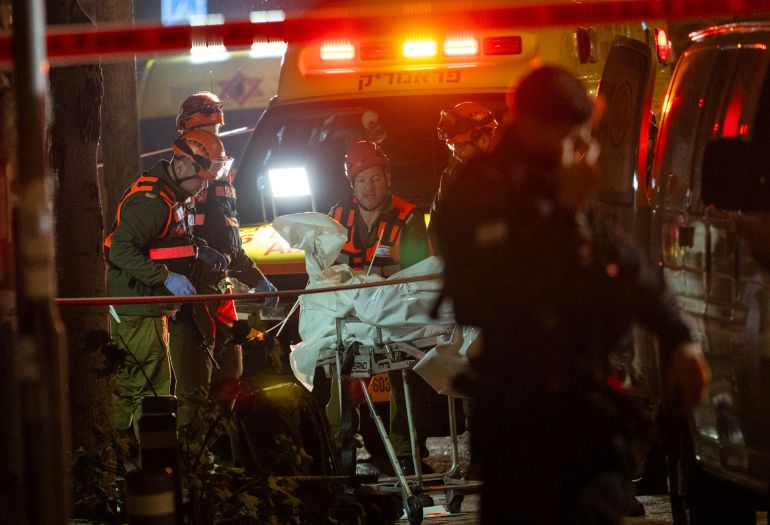 TEL AVIV, ISRAEL - MARCH 27: First responders attend the scene after one person was killed from shrapnel after an Iranian missile strike on March 27, 2026 in Tel Aviv, Israel. Israel is now fighting a war on two fronts - with Hezbollah in Lebanon and against Iran - after the United States and Israel launched a joint attack on Iran early on February 28th. (Photo by Erik Marmor/Getty Images)