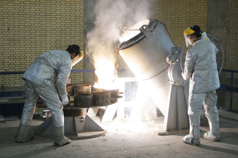 ISFAHAN, IRAN - MARCH 30: Technicians work inside of a uranium conversion facility producing unit March 30, 2005 just outside the city of Isfahan, about 254 miles (410 kilometers), south of capital Tehran, Iran. The cities of Isfahan and Natanz in central Iran are home to the heart of Iran's nuclear program. The facility in Isfahan makes hexaflouride gas, which is then enriched by feeding it into centrifuges at a facility in Natanz, Iran. Iran's President Mohammad Khatami and the head of Iran's Atomic Energy Organisation Gholamreza Aghazadeh visited the facilities. (Photo by Getty Images)