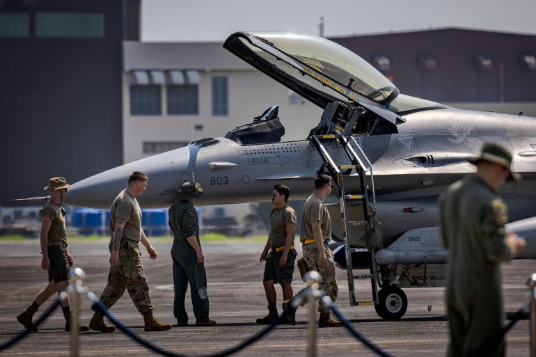 MABALACAT, PHILIPPINES - MAY 09: U.S. Air Force soldiers prepare an F16 fighter jet during U.S.-Philippines joint air force exercises dubbed Cope Thunder at Clark Air Base on May 09, 2023 in Mabalacat, Pampanga province, Philippines. Joint patrols between the Philippines and the United States in the South China Sea may begin by the third quarter of this year according to a top Philippine diplomat. This development comes amid heightened tensions in the region and follows Washington's clarification of its commitment to defend Manila from an attack at sea. (Photo by Ezra Acayan/Getty Images)