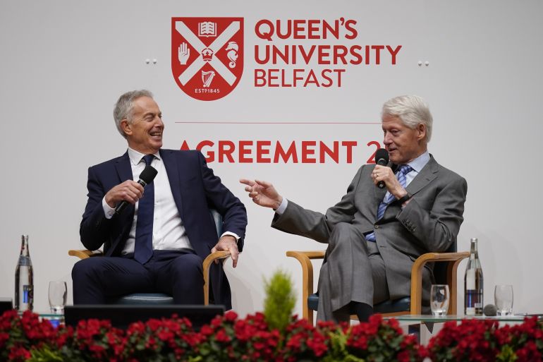 BELFAST, NORTHERN IRELAND - APRIL 17: Former British Prime Minister, Tony Blair (L) and former US President Bill Clinton share the stage on the first day of a three-day conference to mark the 25th anniversary of the Good Friday Agreement, at Queen's University on April 17, 2023 in Belfast, Northern Ireland. The Good Friday Agreement, brokered by Washington and ratified by governments in London and Dublin, largely ended three decades of devastating sectarian conflict in Northern Ireland and intermittent terrorist attacks on mainland Britain. (Photo by Niall Carson - Pool/Getty Images)