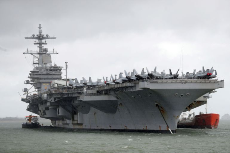 The US Navy Nimitz-class aircraft carrier USS George H.W. Bush as it lays at anchor off the coastbefore it participates n Exercise Saxon Warrior 2017 in the Northern Atlantic Ocean. (Photo by Andrew Matthews/PA Images via Getty Images)