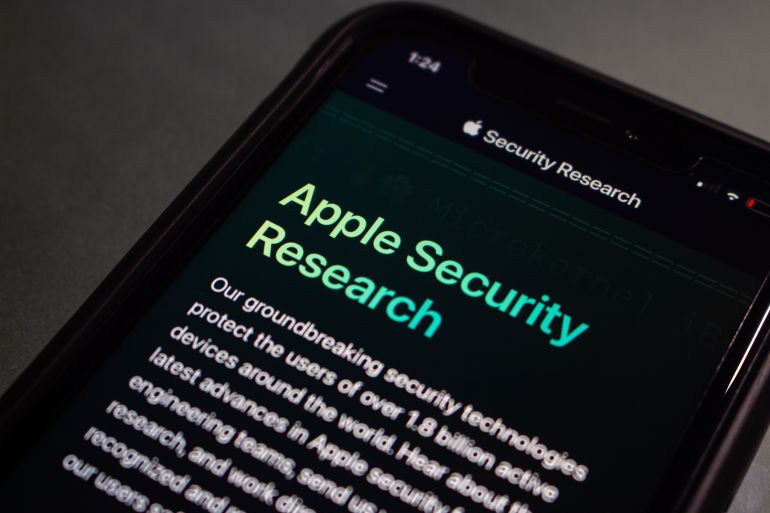 ios2-1775984748 Vancouver, CANADA - Nov 19 2022 : Apple Security Research website on an iPhone screen.