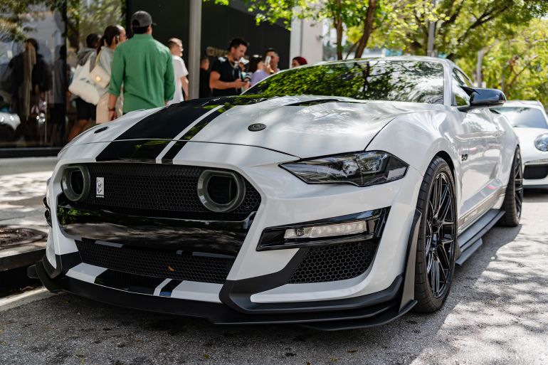 Miami, Florida, USA - February 16, 2025: Luxury car Ford VI Shelby. Car Ford VI Shelby parked outdoor. White black car, top view. Ford Mustang VI Shelby sport car; Shutterstock ID 2769827561; purchase_order: aj; job: ; client: ; other: