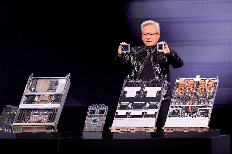Nvidia CEO Jensen Huang holds a Rubin GPU, and a Vera CPU, part of the Nvidia Vera Rubin NVL72 AI supercomputer, during a Nvidia keynote address at CES 2026, an annual consumer electronics trade show, in Las Vegas, Nevada, U.S. January 5, 2026. REUTERS/Steve Marcus