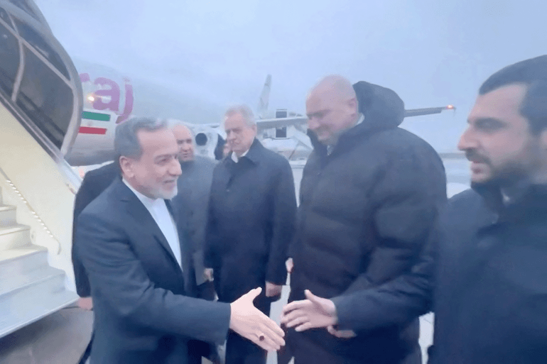 Iran's Foreign Affairs Minister Abbas Araqchi is greeted by officials, according to Iran's media, during his visit to Russia for talks with Russian President Vladimir Putin, in a place given as St. Petersburg, Russia, in this screenshot from a video released on April 27, 2026. Seyed Abbas Araghchi via Telegram/Handout via REUTERS THIS IMAGE HAS BEEN SUPPLIED BY A THIRD PARTY. MANDATORY CREDIT.NO RESALES. NO ARCHIVES. VERIFICATION: Reuters could not confirm the date and location. No older versions of the video were found posted online before April 27. Iranian media reported that Iranian Foreign Minister Abbas Araqchi arrived in Russia for talks with Putin