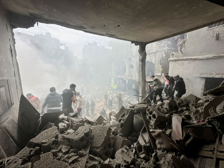 People gather as rescuers work at the site of an Israeli strike, amid escalating hostilities between Israel and Hezbollah, as the U.S.-Israel conflict with Iran continues, in the Jnah area in Beirut, Lebanon, April 5, 2026. REUTERS/Stringer TPX IMAGES OF THE DAY