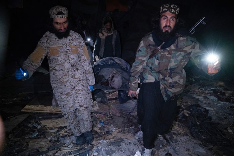 pic-99814-1773702959 Taliban security personnel carry a body after Pakistani airstrikes allegedly hit the Secondary Rehabilitation Services Centre in Kabul on March 16, 2026. Heavy casualties were feared on Tuesday after Afghanistan accused Pakistan of hitting a treatment centre for drug addicts in the capital, Kabul, and killing civilians. Pakistan denied deliberately targeting the facility, instead saying it had conducted precision strikes on "military installations and terrorist support infrastructure". The Pakistani military has struck Kabul several times in recent weeks, as part of a conflict sparked by claims that the Taliban government has harboured extremists who have carried out attacks across the border. (Photo by Wakil KOHSAR / AFP)