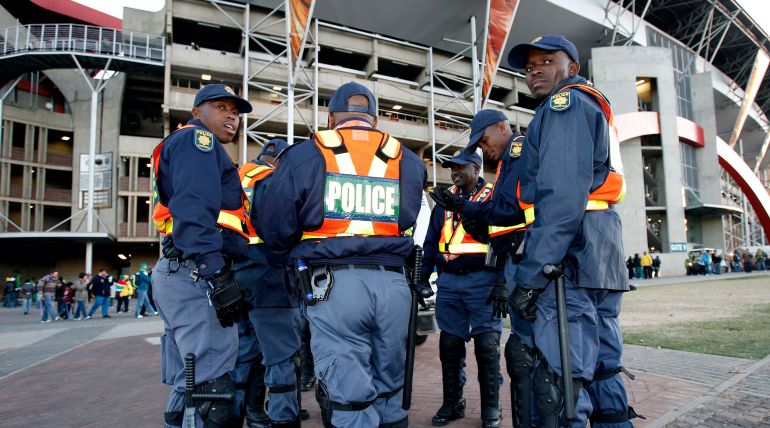 Football - Brazil v North Korea FIFA World Cup South Africa 2010 - Group G - Ellis Park Stadium, Johannesburg, South Africa - 15/6/10 Police take the place of stewards at Ellis Park who have walked out on strike before the game between Brazil v North Korea Mandatory Credit: Action Images / Carl Recine Livepic
