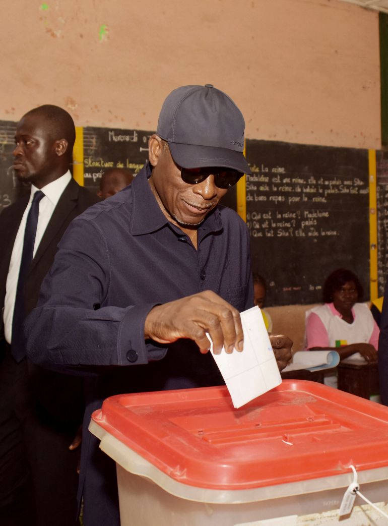 Benin's President Patrice Talon votes at a polling station during the parliamentary election in Cotonou, Benin, January 11, 2026. REUTERS/Charles Placide Tossou