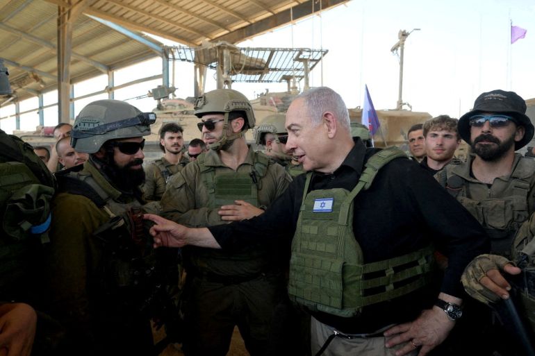 FILE PHOTO: Israeli Prime Minister Benjamin Netanyahu visits Israeli soldiers in Rafah, in the southern Gaza Strip, July 18, 2024. Avi Ohayon/GPO/Handout via Reuters/File Photo THIS IMAGE HAS BEEN SUPPLIED BY A THIRD PARTY.