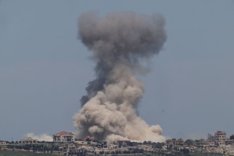 Smoke rises in Lebanon after an explosion, as seen from the Israeli side of the Israel-Lebanon border, in northern Israel, April 25, 2026. REUTERS/Florion Goga