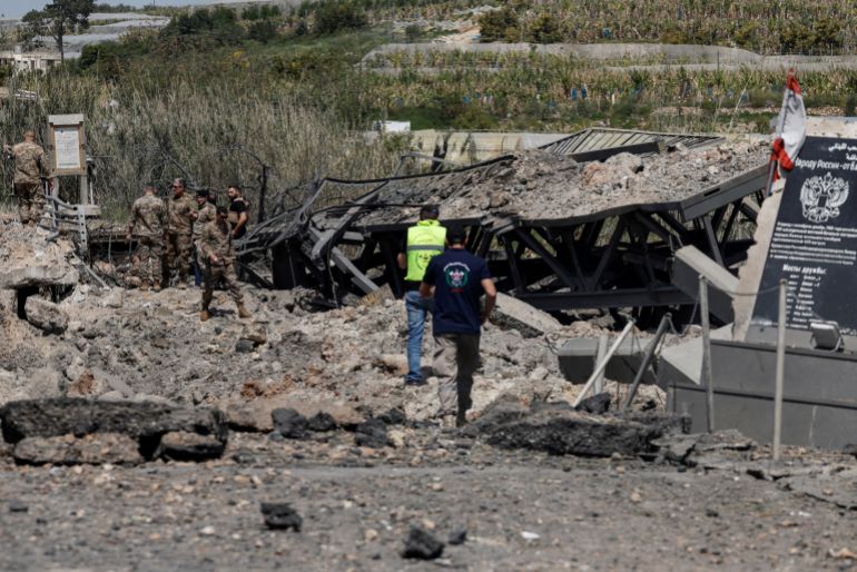 reuters_69ef43ad-1777288109-1 Members of the Lebanese army work at the site after an Israeli strike severed the last remaining bridge linking southern Lebanon to the rest of the country, in Qasmiyeh, Lebanon April 16, 2026. REUTERS/Louisa Gouliamaki