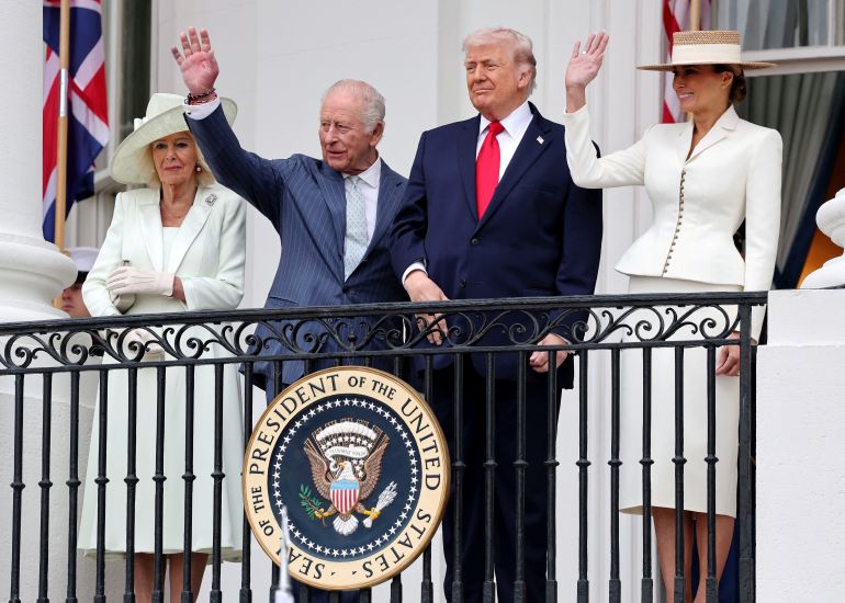 Queen Camilla, King Charles III, U.S. President Donald Trump and First Lady Melania Trump watch a 'Pass in Review' from the balcony of the South Portico during the State Arrival Ceremony on the South Lawn on day two of the State Visit of King Charles III and Queen Camilla to the United States of America, on April 28, 2026 in Washington, DC. Chris Jackson/Pool via REUTERS