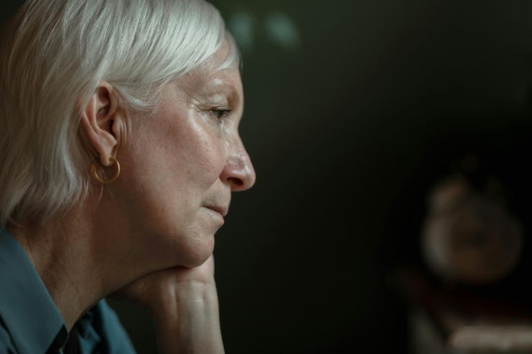 Side Profile of an Elderly Woman with Serious Face