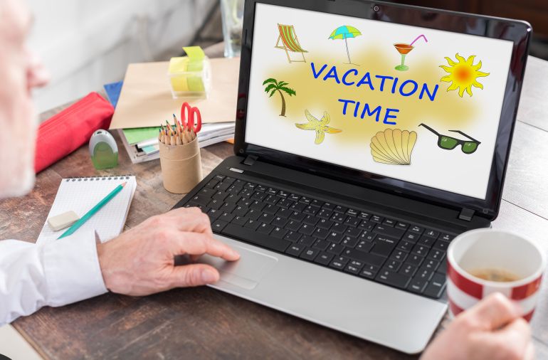 Vacation time concept shown on a laptop screen